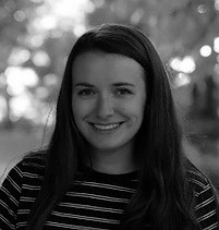 Shira black and white headshot.jpg