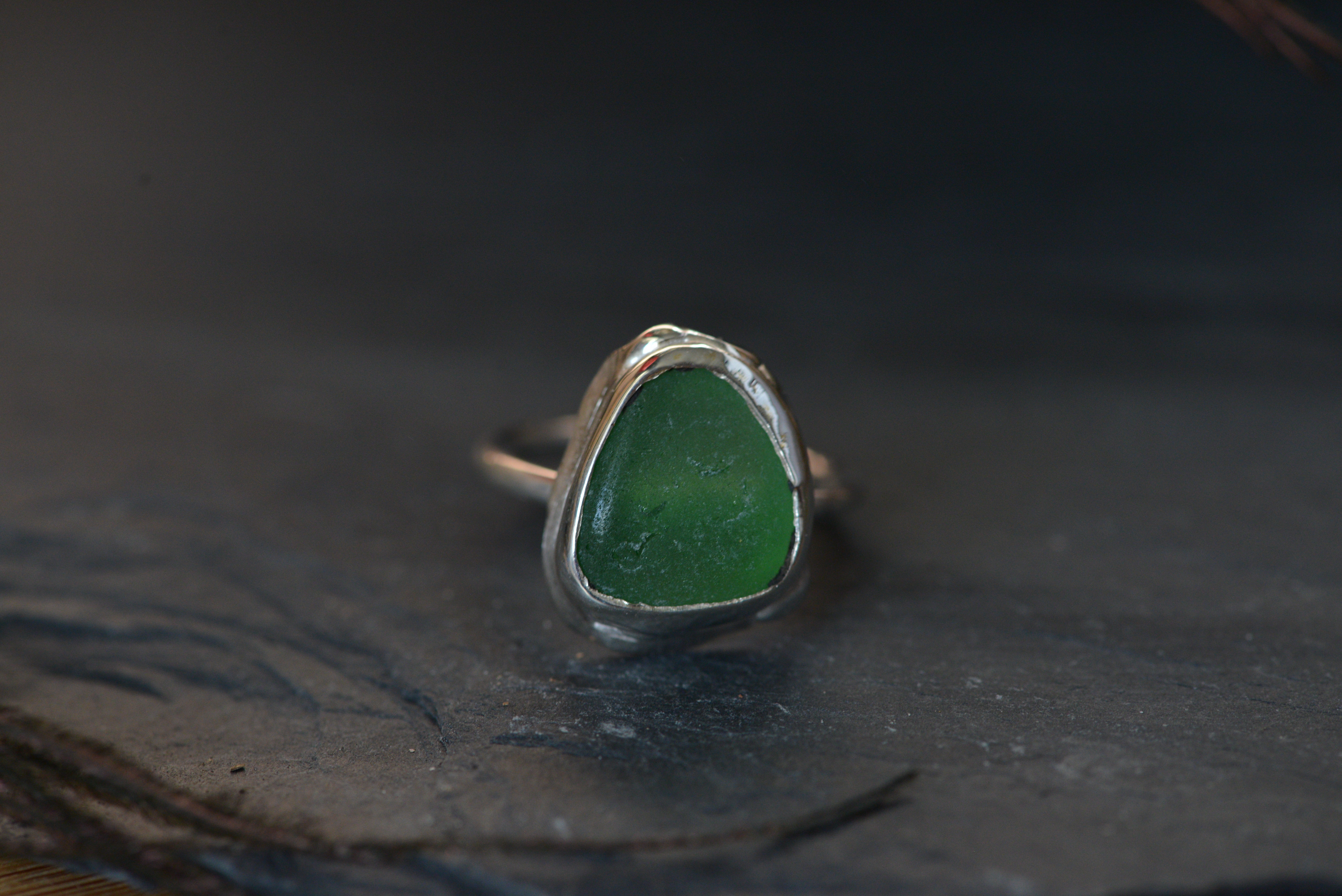 Green sea glass set on sterling silver ring