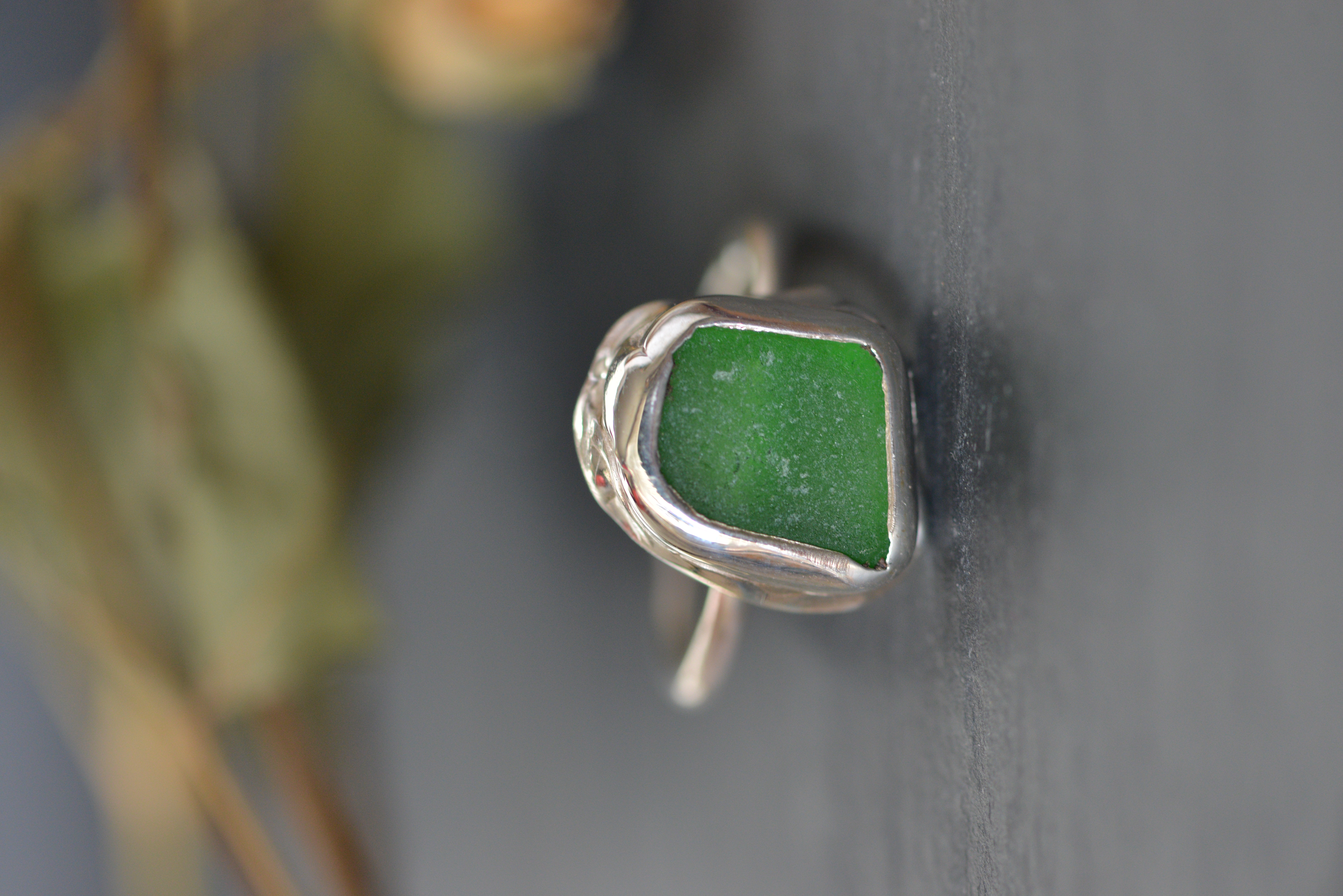 Green sea glass set on sterling silver ring
