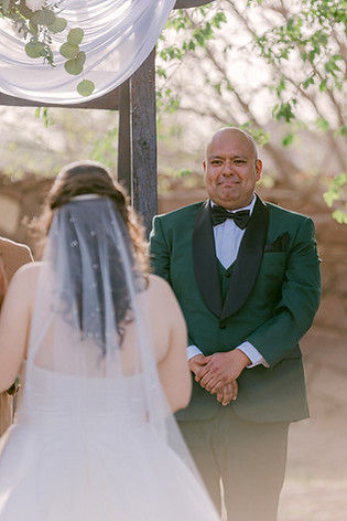 The first look. Groom gets emotional when he sees the bride walking down the aisle. El Paso weddng photographer.
