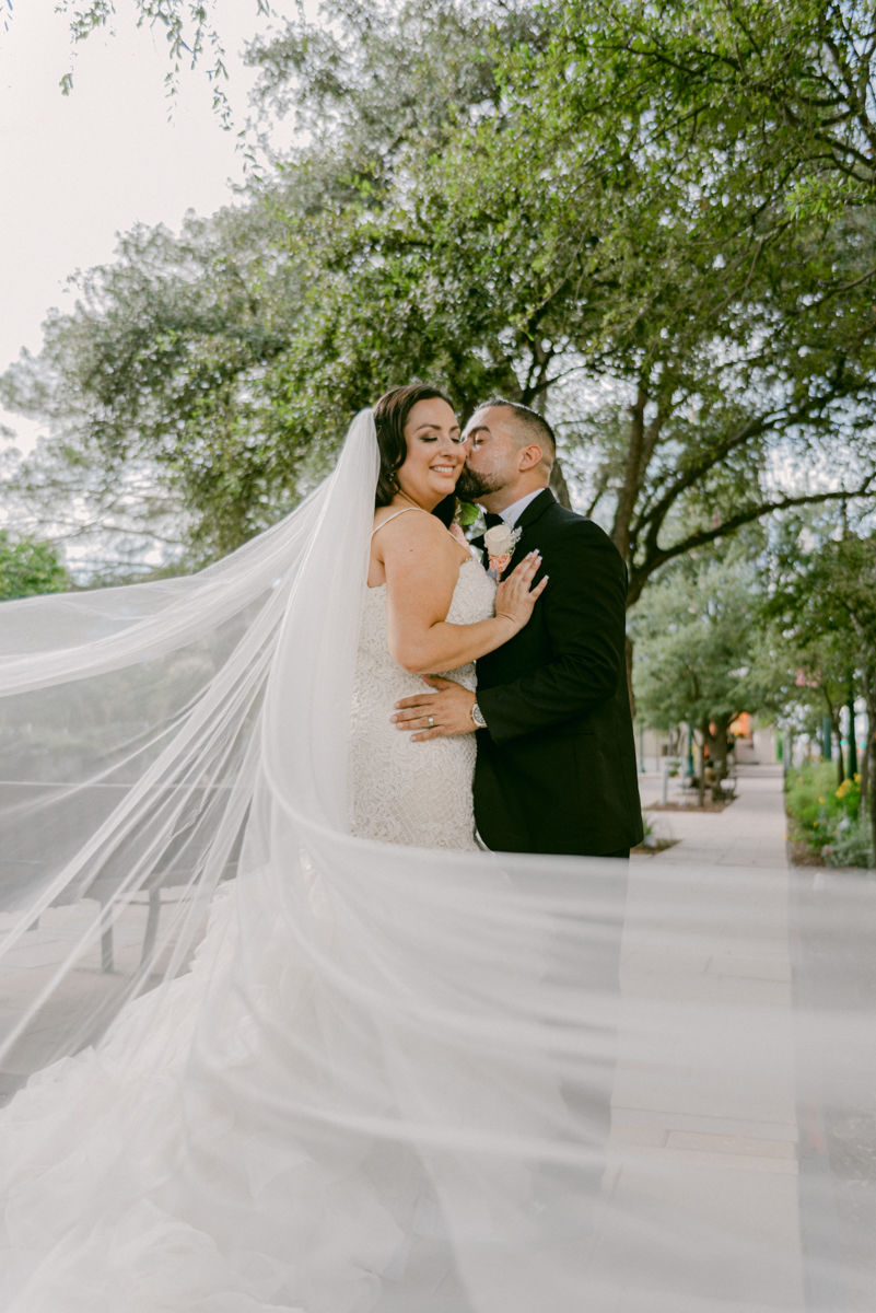 bride and groom in downtown El Paso. wedding photography Photo by Jess