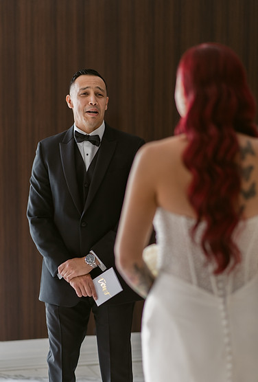 The first look. Groom gets emotional when he turns to see the bride. Emotive, storytelling wedding photography in El Paso Texas.