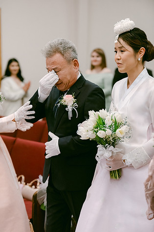 emotive wedding photographer in El Paso, Photo by Jess. Father of the bride cries as he walks the bride down the aisle.