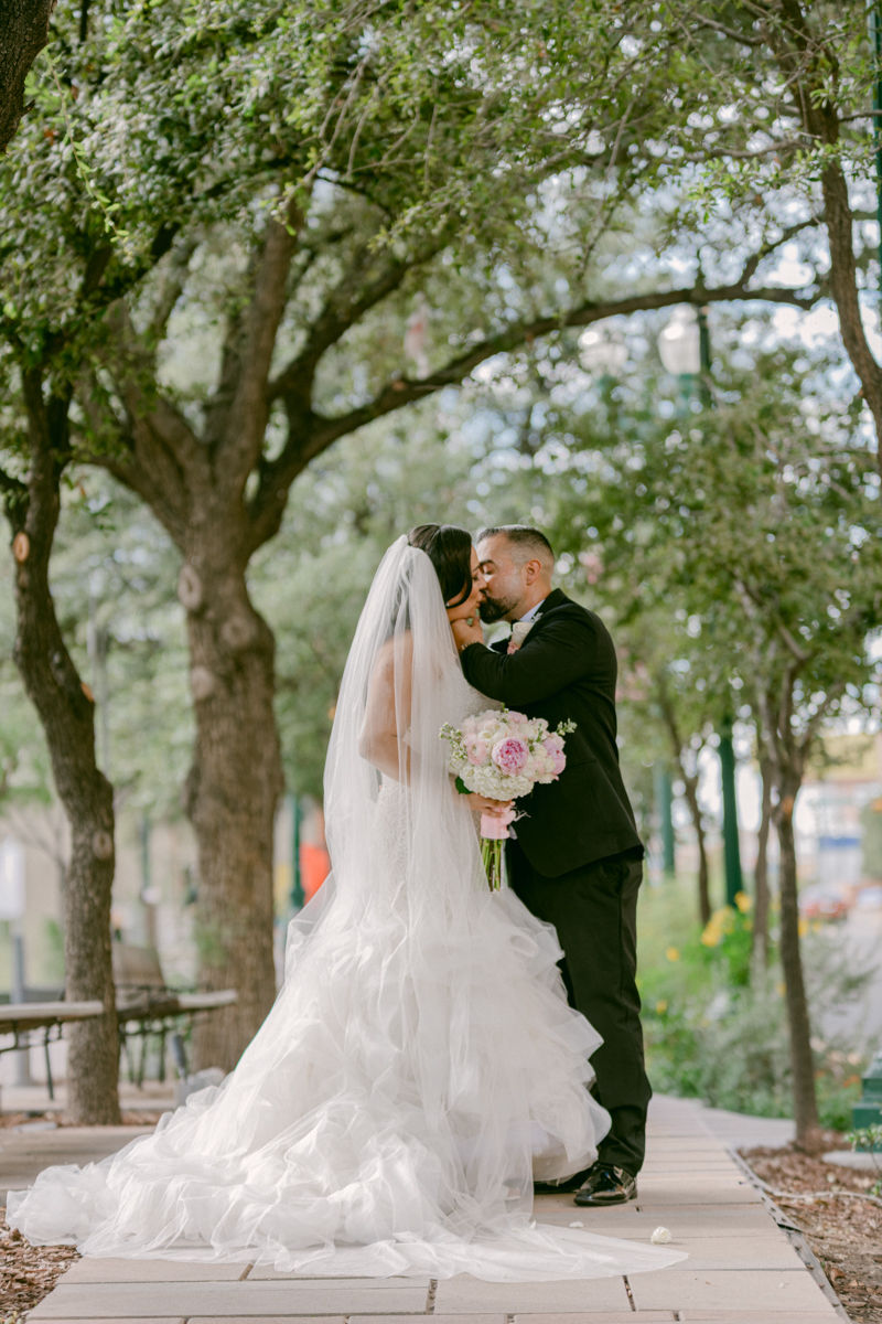 bride and groom in downtown El Paso. wedding photography Photo by Jess