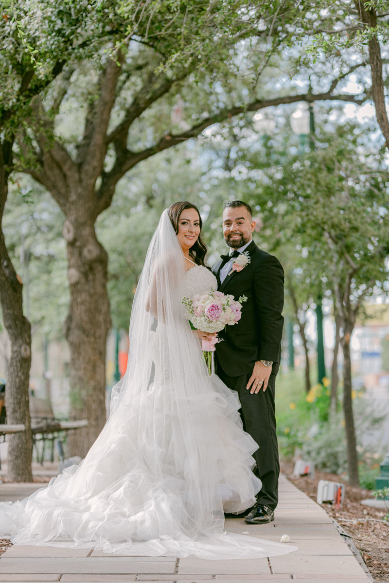bride and groom in downtown El Paso. wedding photography Photo by Jess