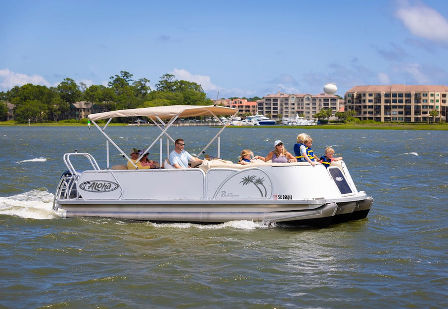 Family enjoying a day on the pontoon