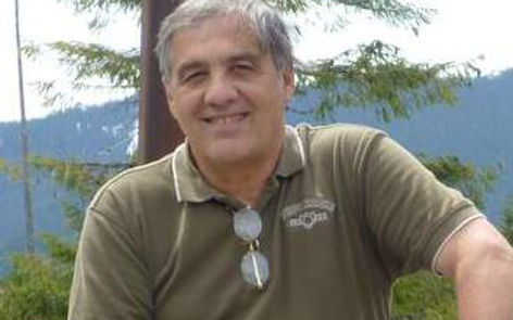 Gene sitting at bridge cropped  1.jpeg