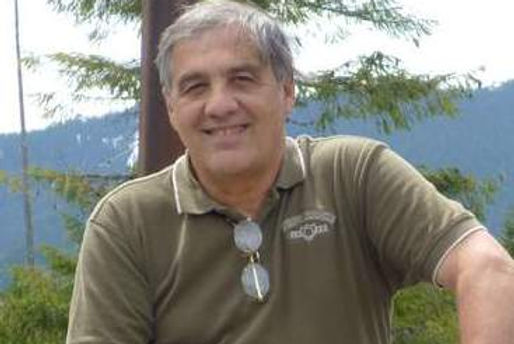 Gene sitting at bridge cropped  1.jpeg