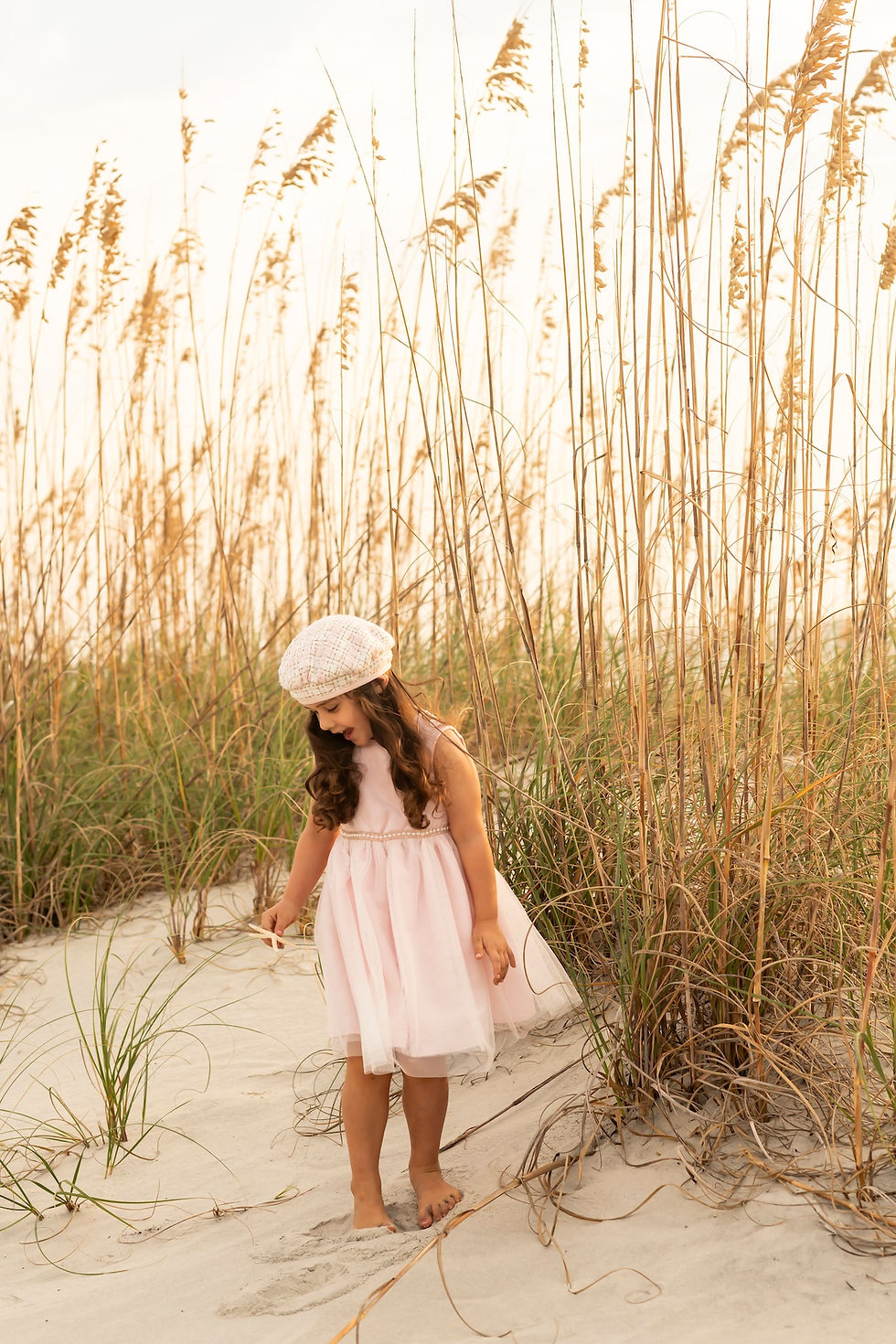 The Elwood family's family portraits on Tybee Island Beach in Savannah, Georgia.