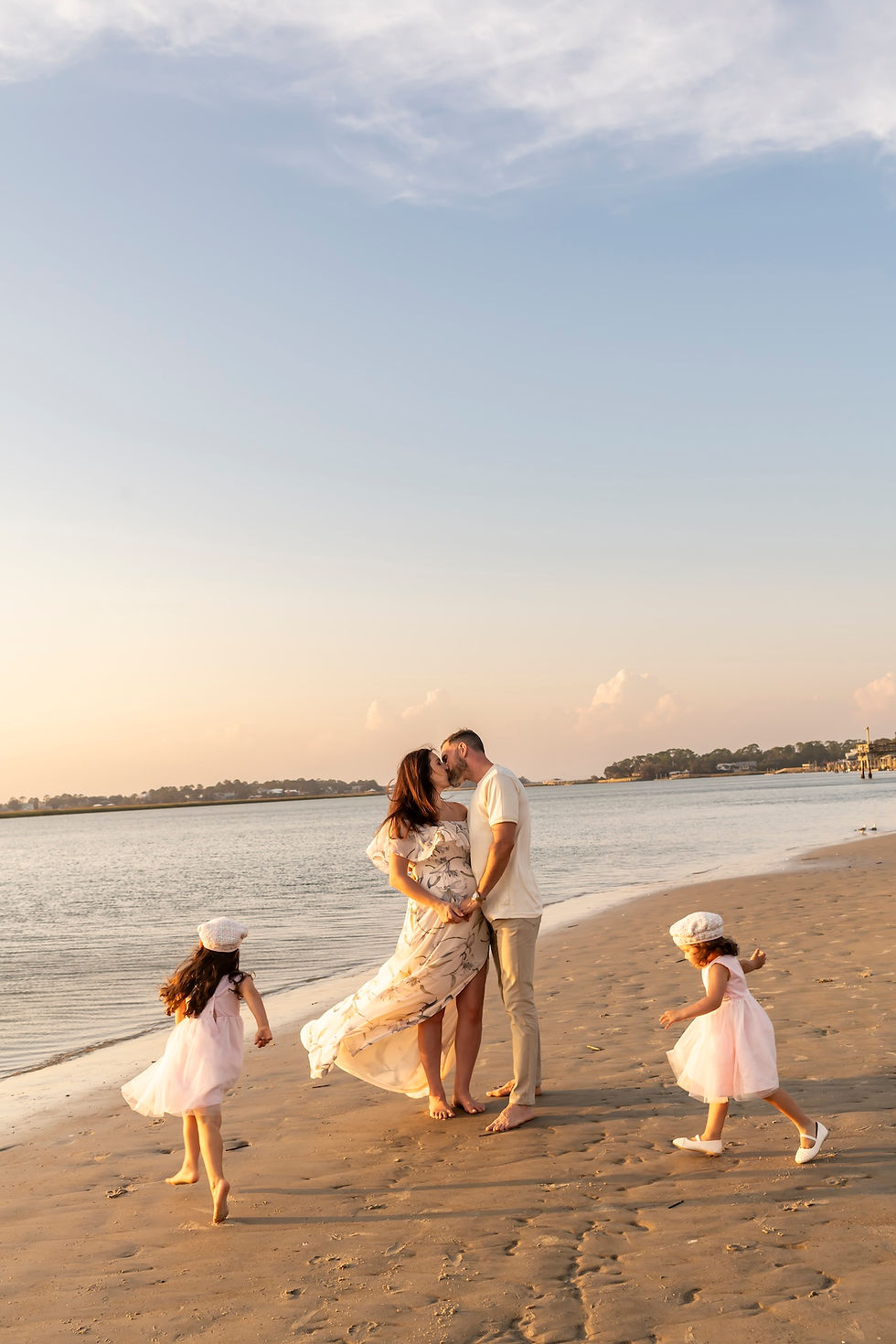 The Elwood family's family portraits on Tybee Island Beach in Savannah, Georgia.