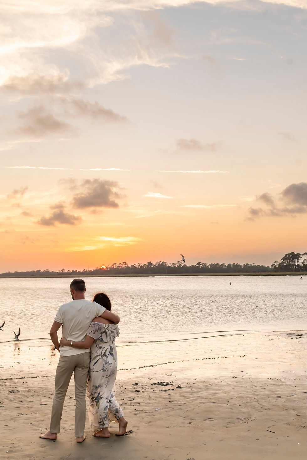 The Elwood family's family portraits on Tybee Island Beach in Savannah, Georgia.