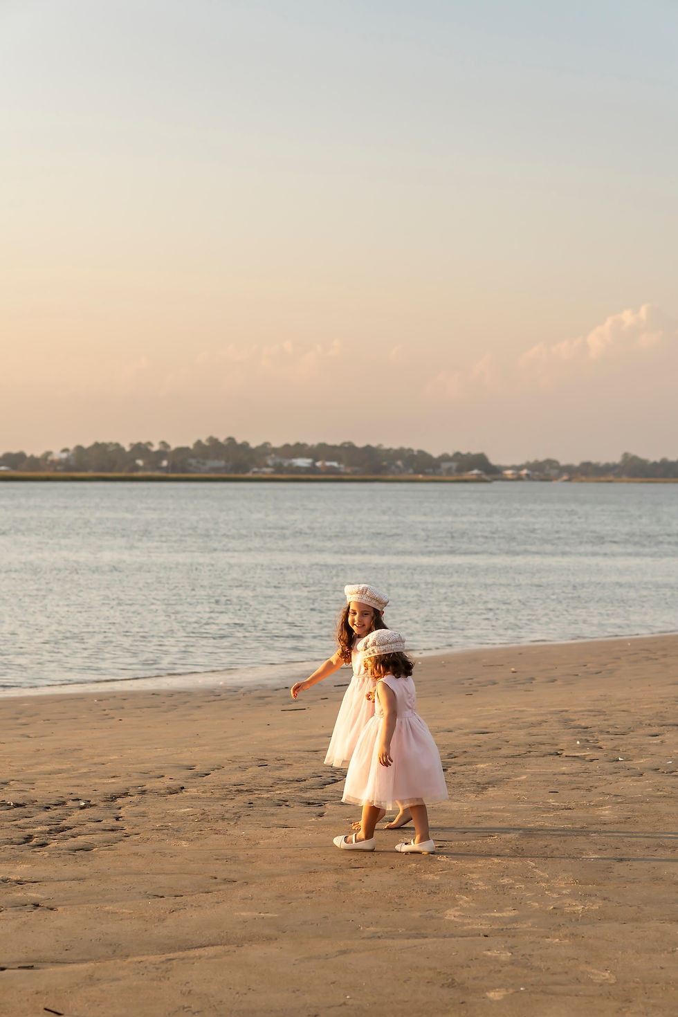 The Elwood family's family portraits on Tybee Island Beach in Savannah, Georgia.