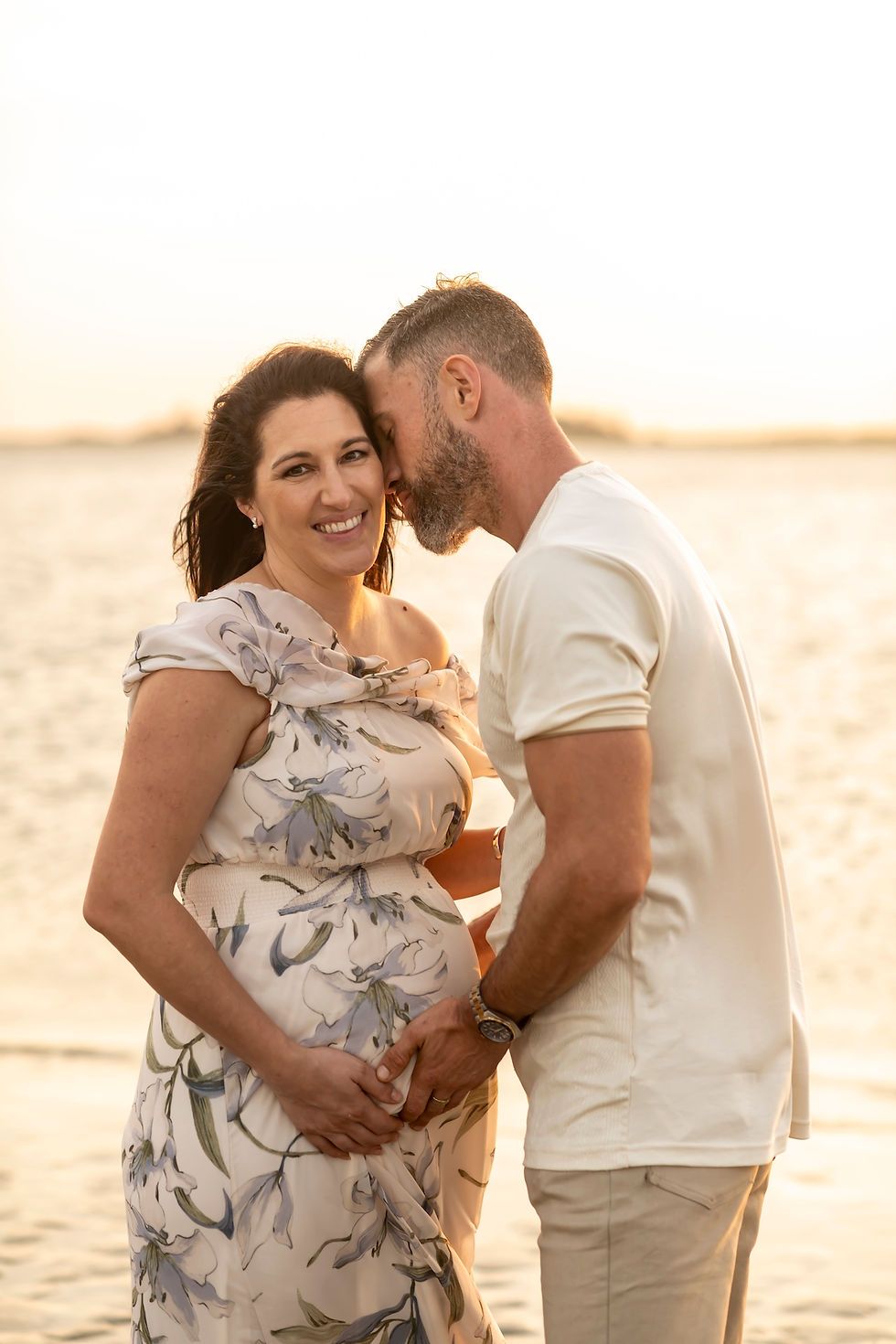 The Elwood family's family portraits on Tybee Island Beach in Savannah, Georgia.