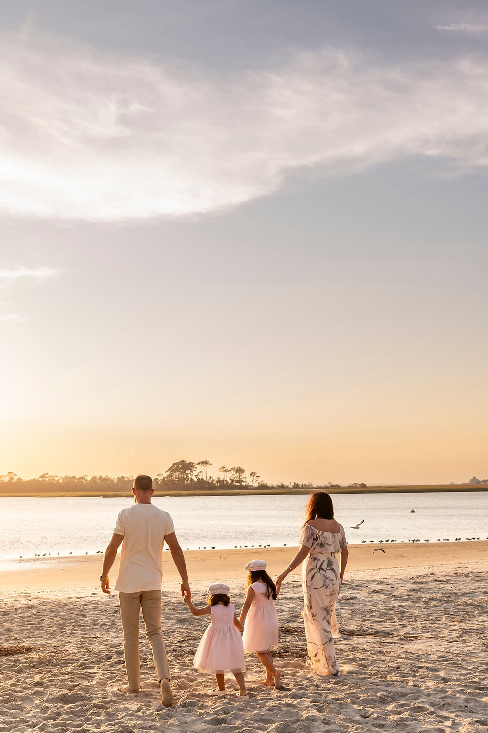 The Elwood family's family portraits on Tybee Island Beach in Savannah, Georgia.