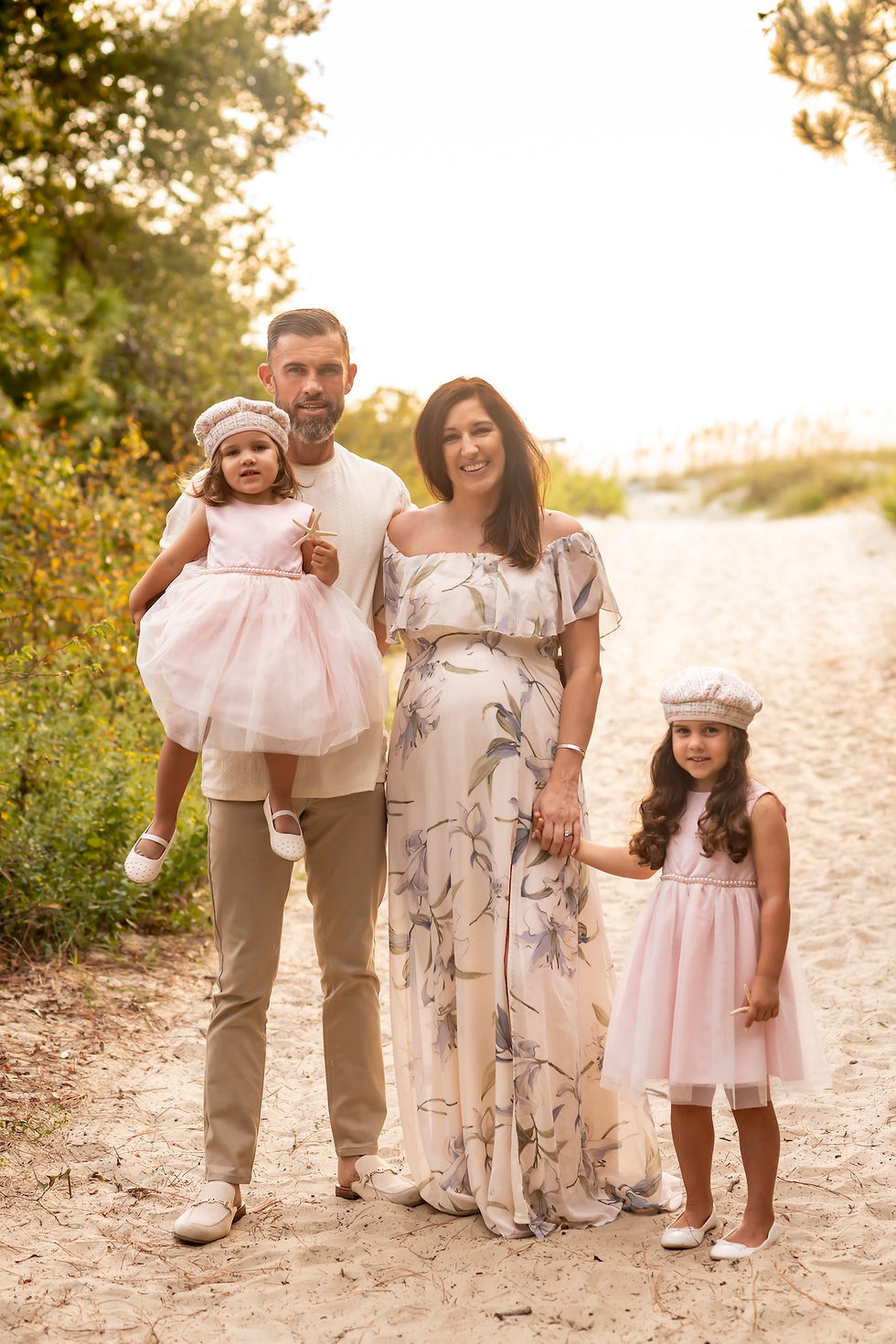 The Elwood family's family portraits on Tybee Island Beach in Savannah, Georgia.