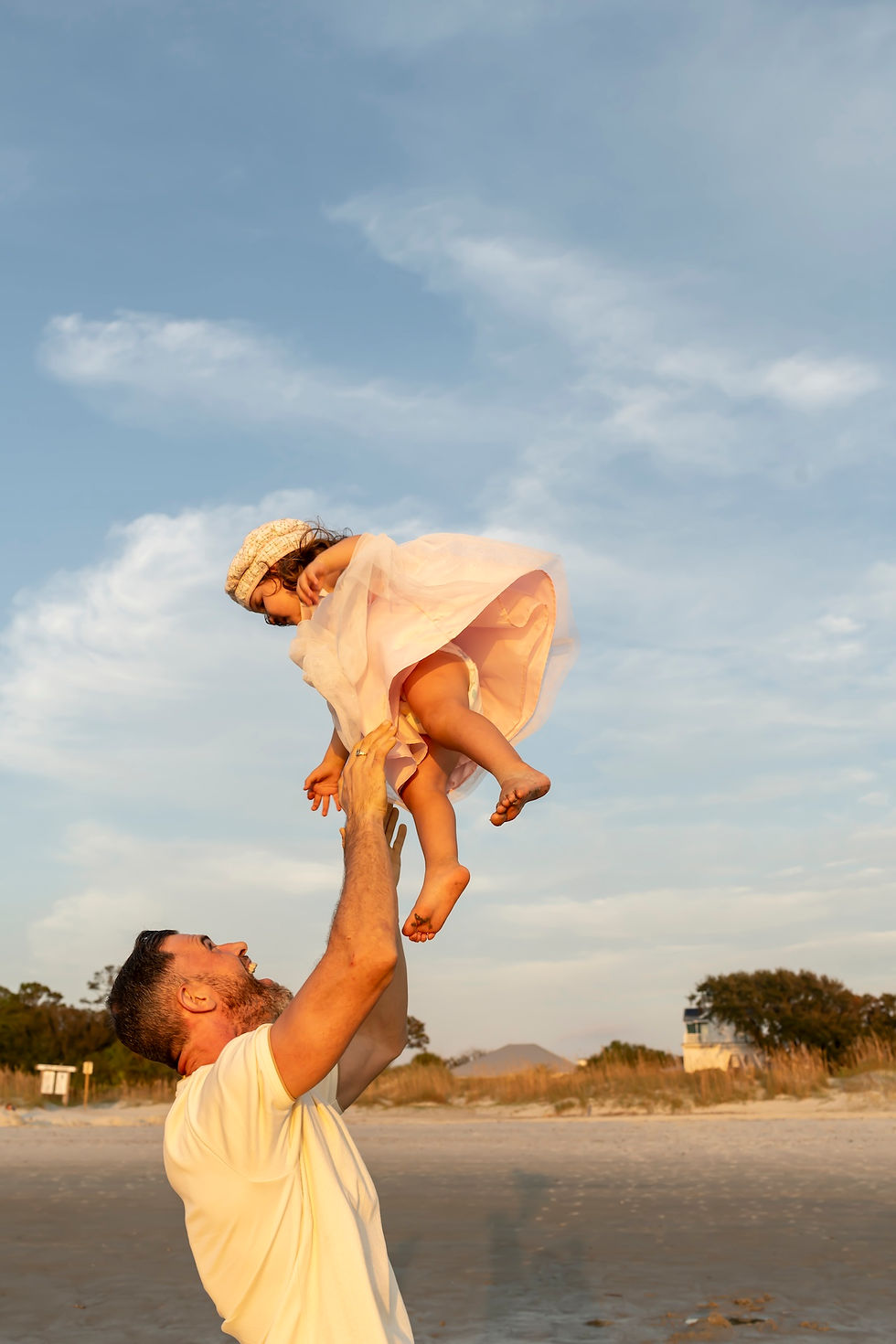 The Elwood family's family portraits on Tybee Island Beach in Savannah, Georgia.