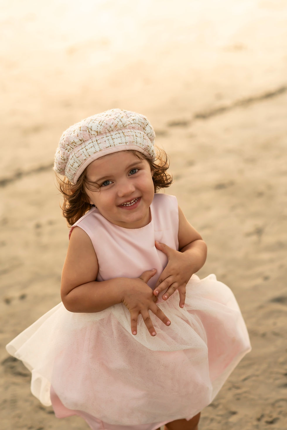 The Elwood family's family portraits on Tybee Island Beach in Savannah, Georgia.