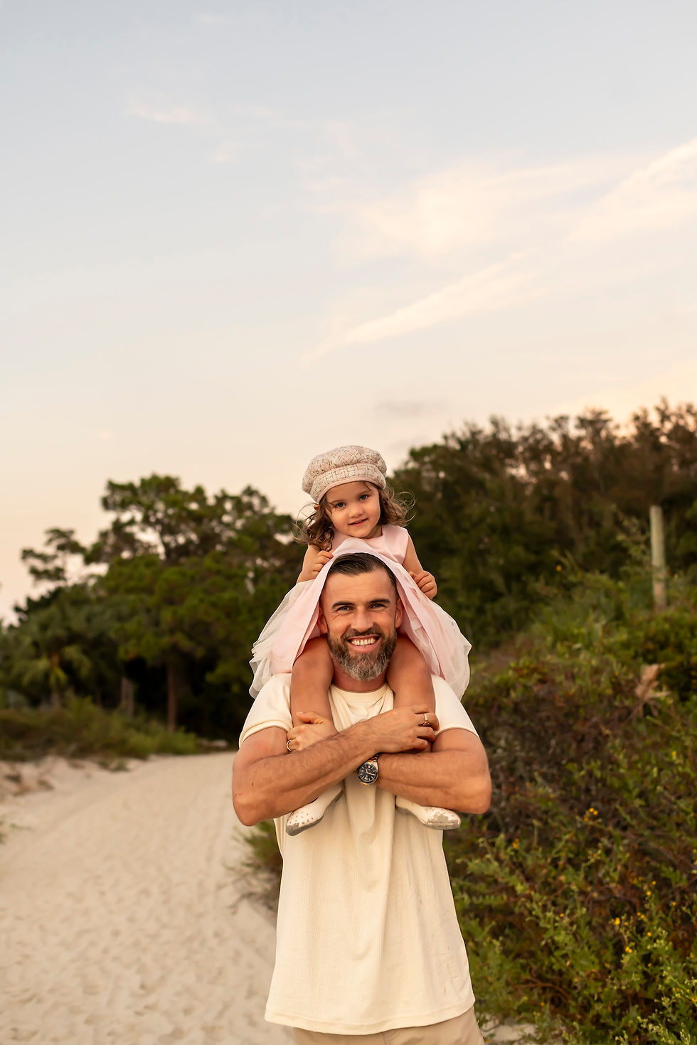 The Elwood family's family portraits on Tybee Island Beach in Savannah, Georgia.