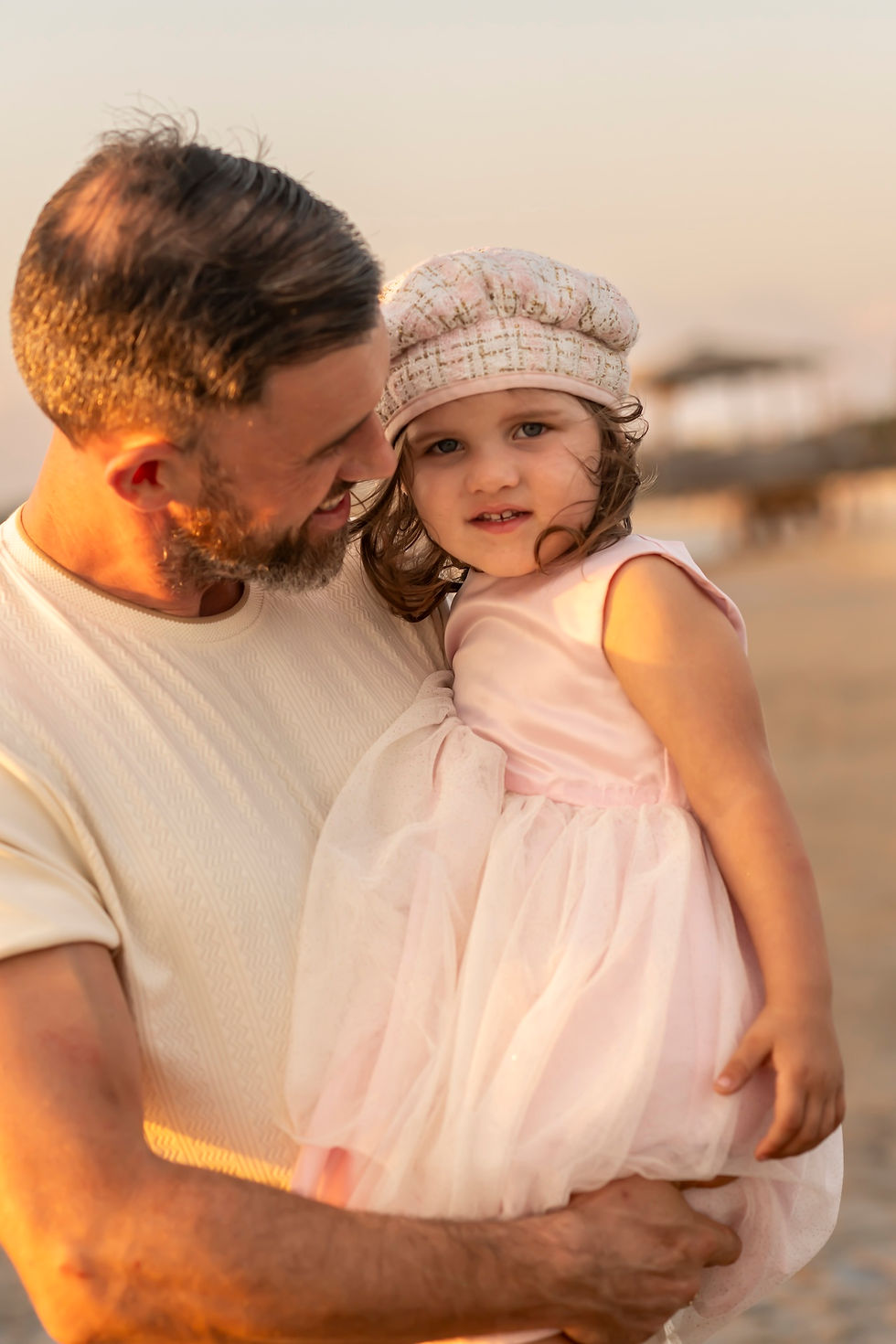The Elwood family's family portraits on Tybee Island Beach in Savannah, Georgia.