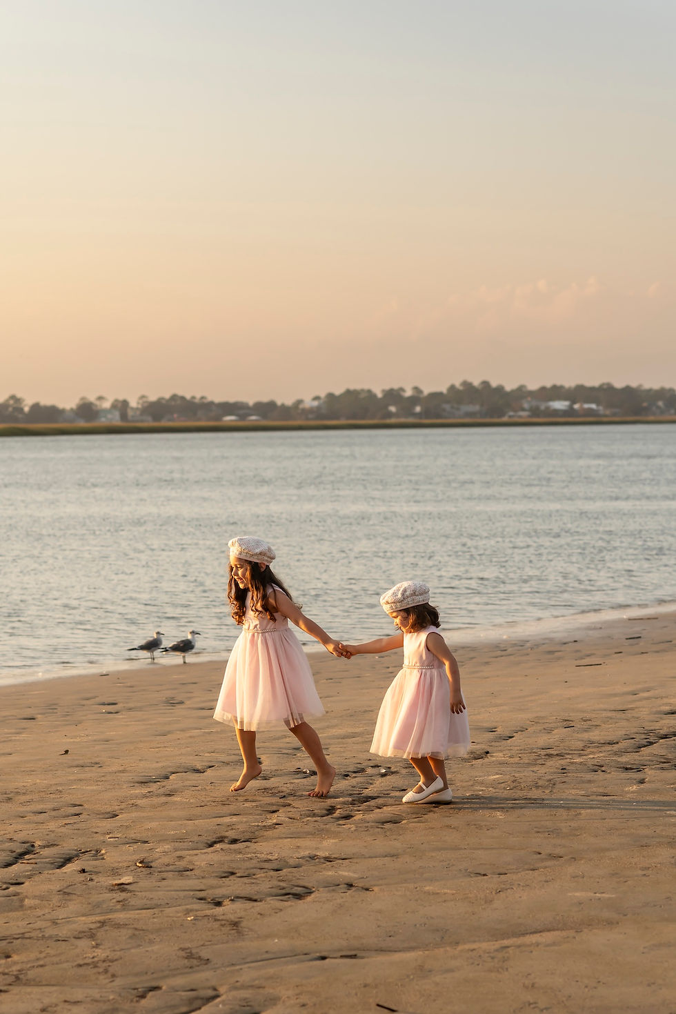 The Elwood family's family portraits on Tybee Island Beach in Savannah, Georgia.