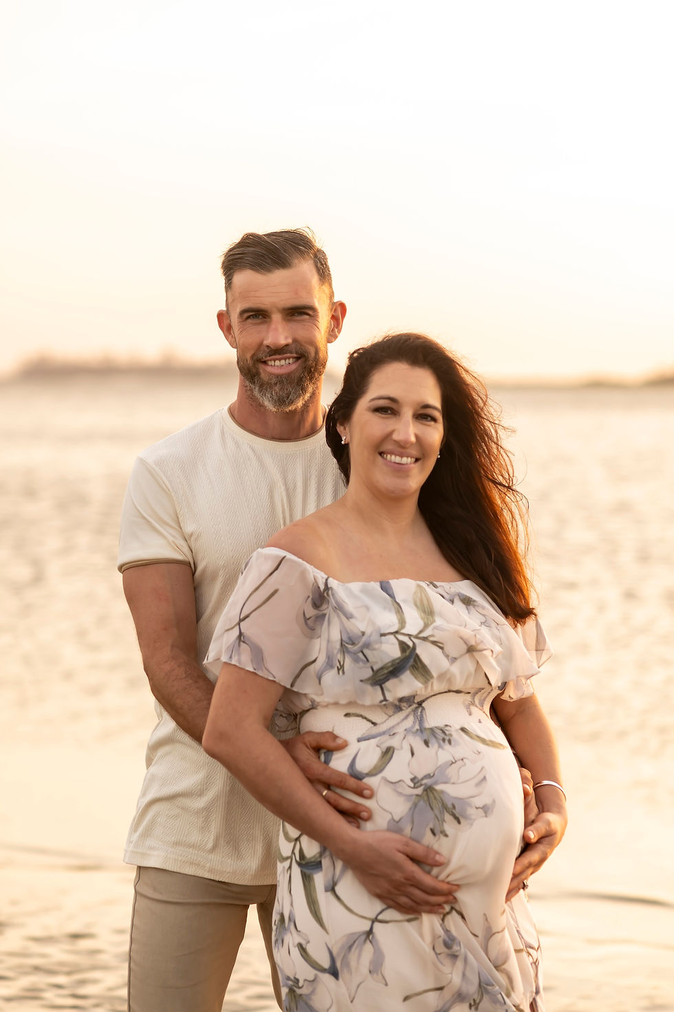 The Elwood family's family portraits on Tybee Island Beach in Savannah, Georgia.