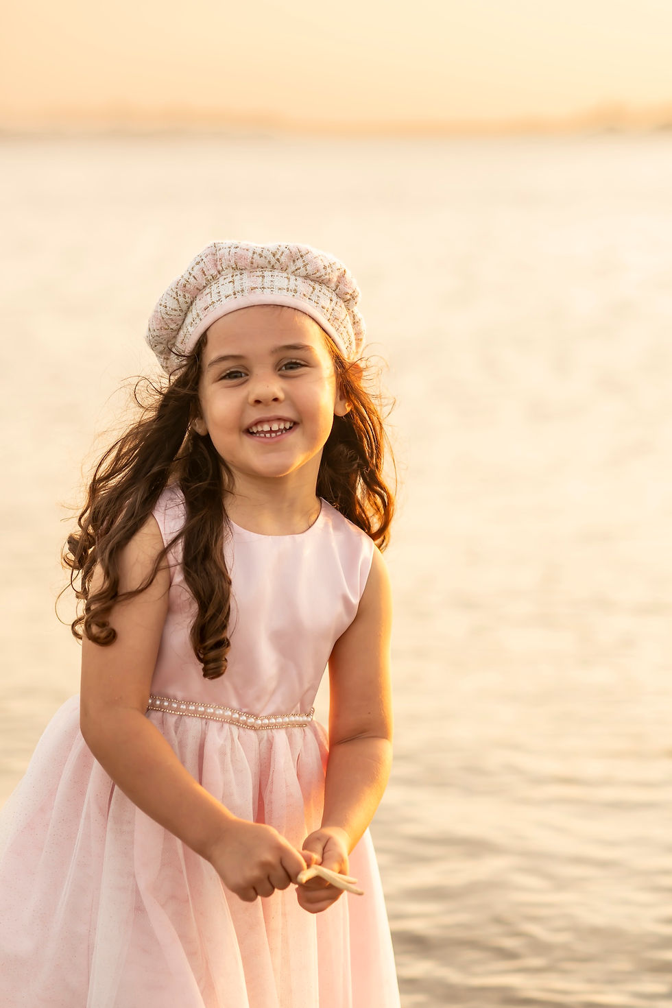 The Elwood family's family portraits on Tybee Island Beach in Savannah, Georgia.