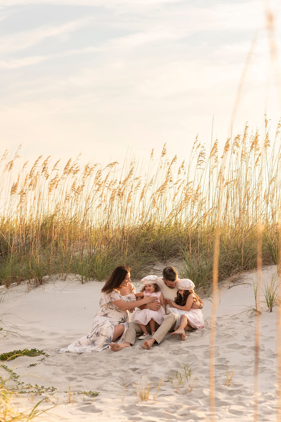 The Elwood family's family portraits on Tybee Island Beach in Savannah, Georgia.