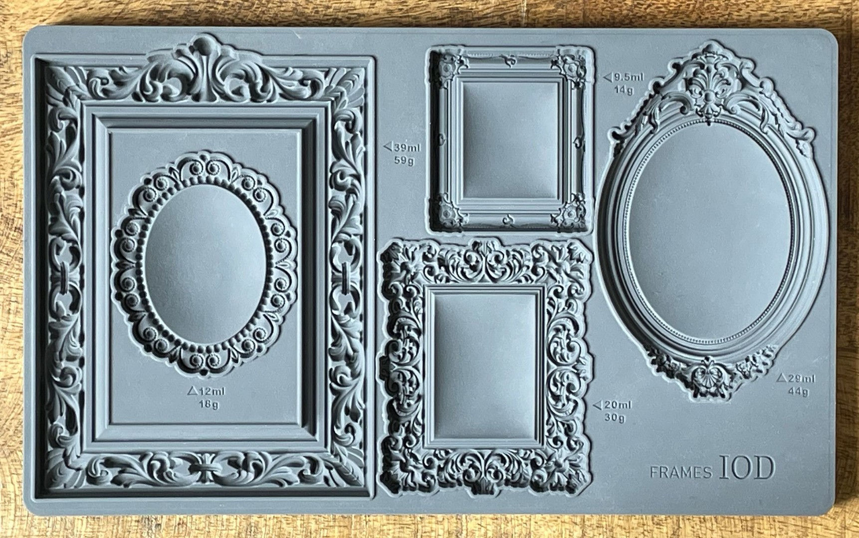 Ornate frame silicone mold with K. Sher 703 and FRAMES text.