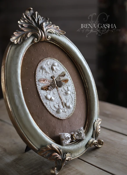 Hand-embroidered dragonfly created with Luneville hook technique using beads, sequins and goldwork e