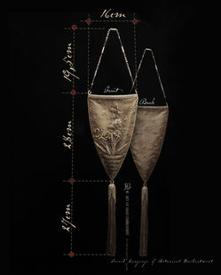 Vintage-inspired black drawstring bag with delicate beige monochrome floral embroidery for evening elegance.