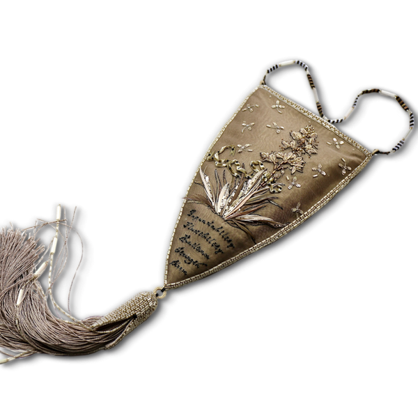 The course title picture shows an embroidered handbag, "beige yucca". It is a beige pouch-style handbag with embroidery and a tassel.