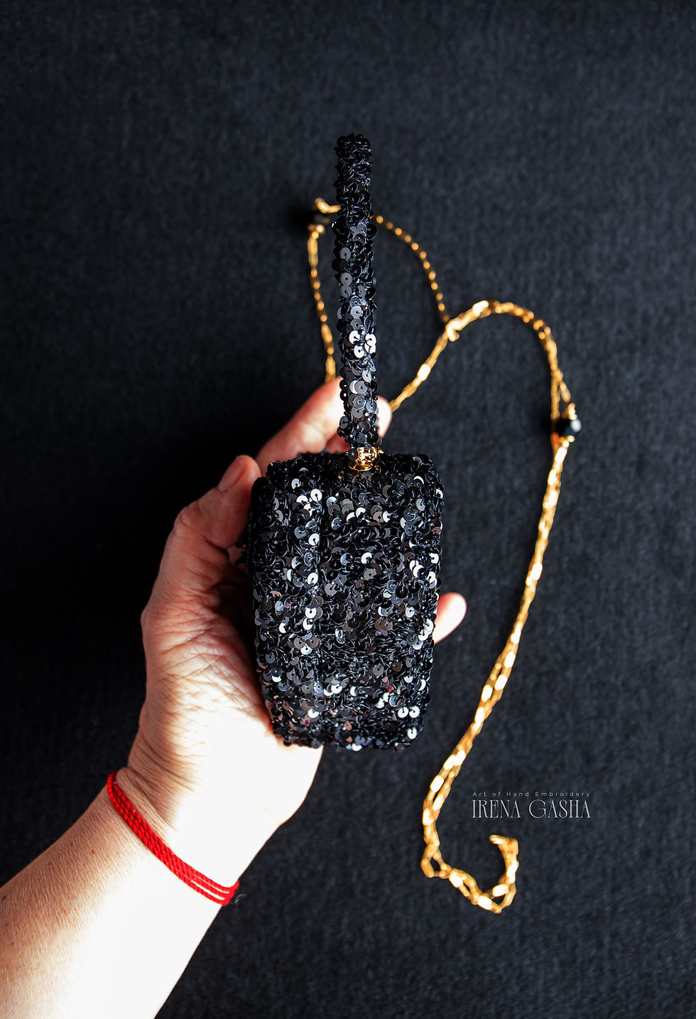 Thumbnail: Hand-embroidered black heart-shaped mini bag with sequins and beads, featuring decorative bow clasp, chain and beaded shoulde