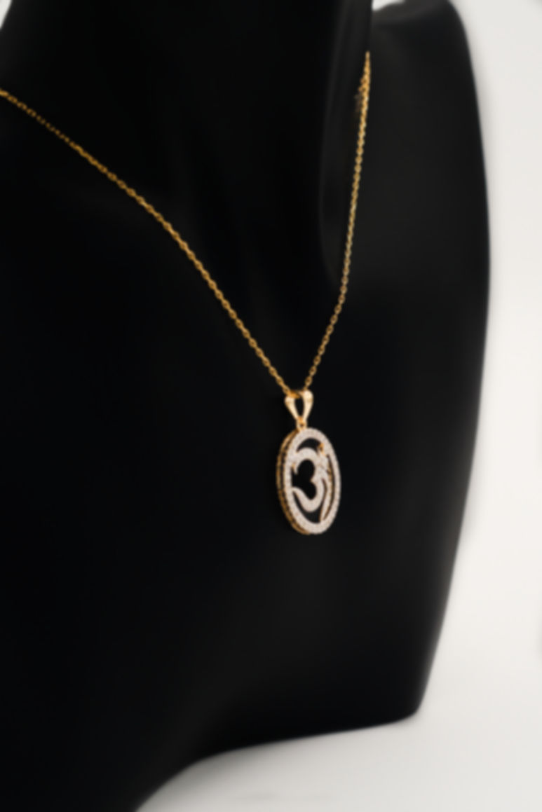 Om Diamond Pendant – 0.56 Carat