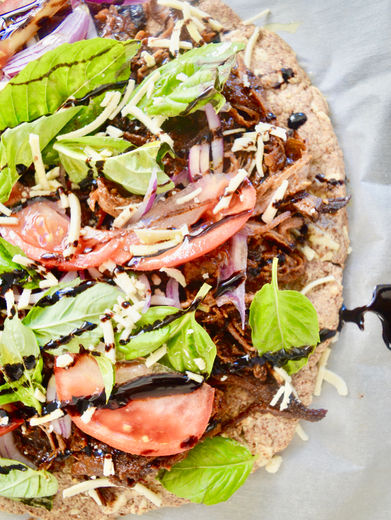 Almond Crust, BBQ Brisket, & vegan cheese makes the best pizza combo! Recipe here!