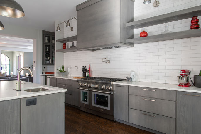 Contemporary Brookhaven kitchen. The kitchen cabinets are Poplar wood with a Castlegate stain from our Aspect line of cabinetry.