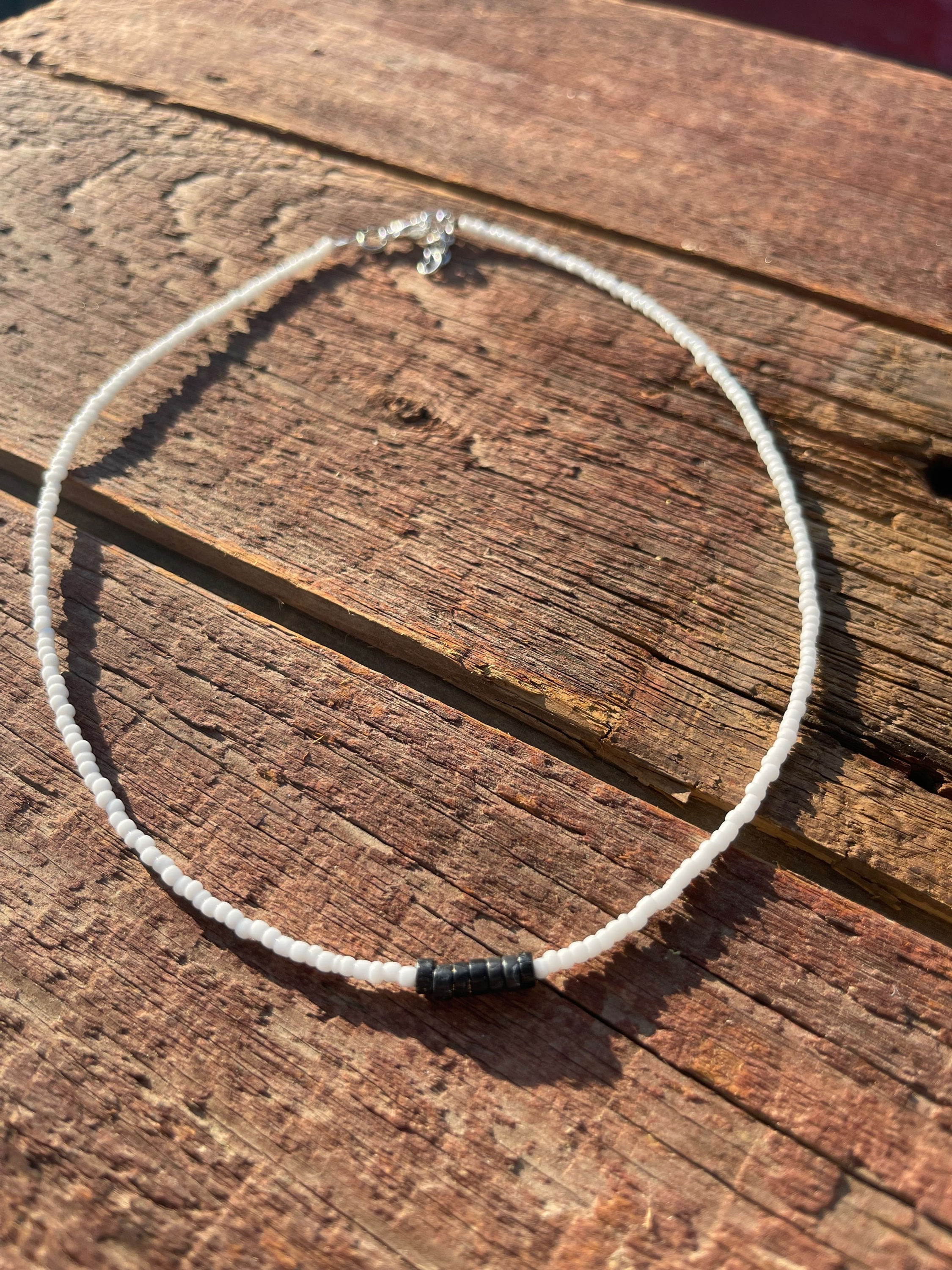 White and black choker style necklace 