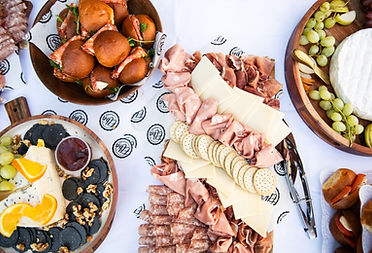 Italian antipasti platter with salumi, cheese and arancini