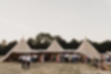 Wedding tipi in field venue surrey triple tipi linked