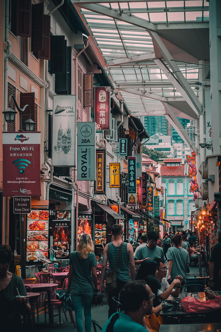 People walking through market