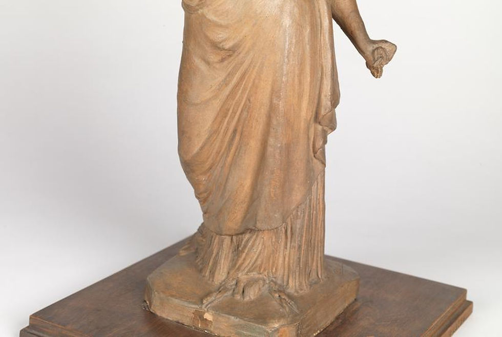 Image credit: Museum of the City of New York (MCNY) Original Terra Cotta Model of Statue of Liberty close of up of broken chains at Liberty’s feet.