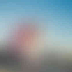 Woman with Union Jack flag on Albert Bridge, London vacation photoshoot by Pennypics.