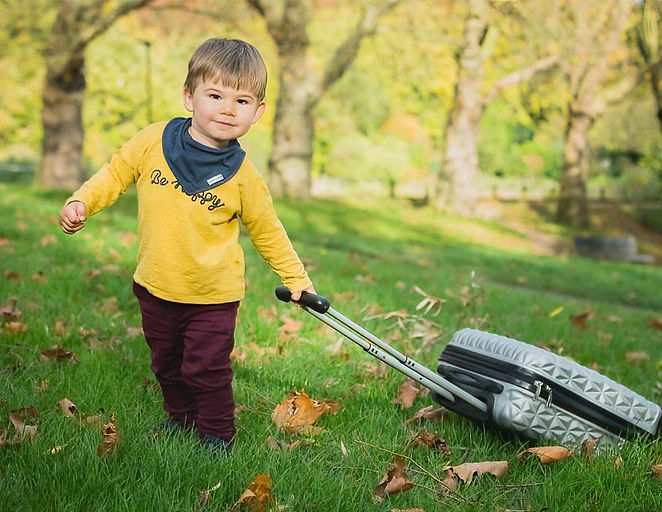 Seasonal Family Photoshoots in London by Pennypics - outdoor family photo shoot - child with a trolley - effortless and lasting portrait family portraits in Lonodn Parks