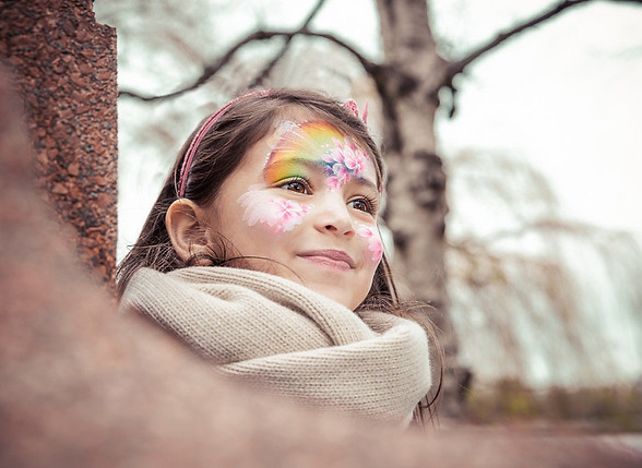 london autumn outdoors family photshoot child with face painted