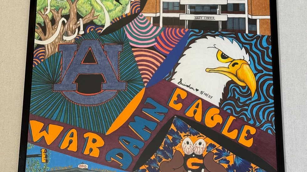 Eye-level view of a gallery wall featuring various mixed media pop art prints