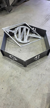 Branded firepit and gate logo.jpg