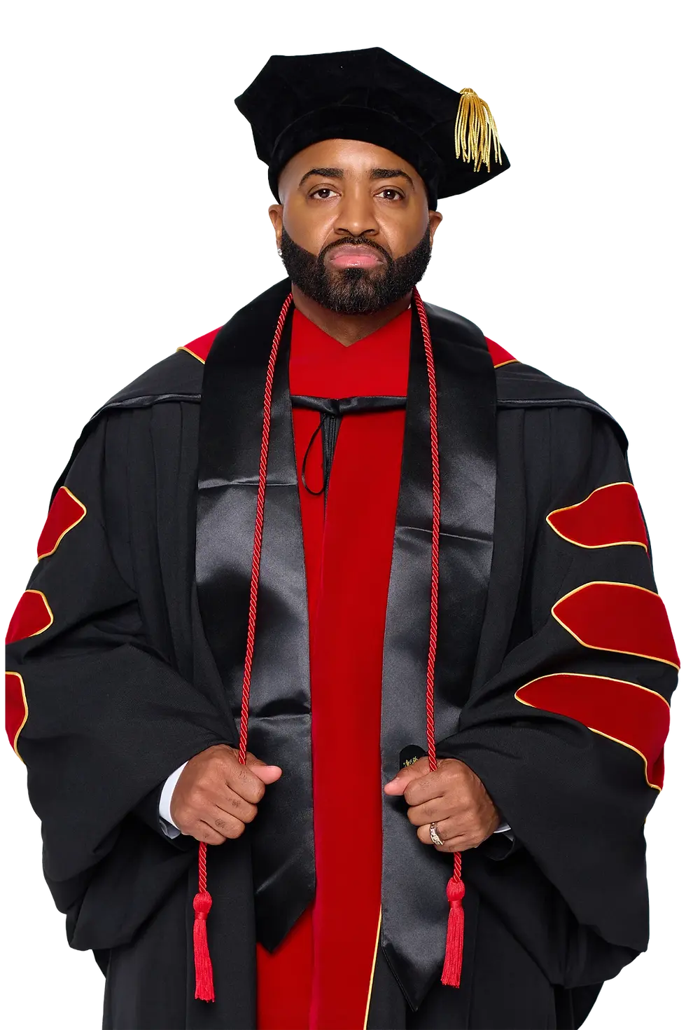 Dr. Kareem DJ Kayotik Thomson in doctoral regalia