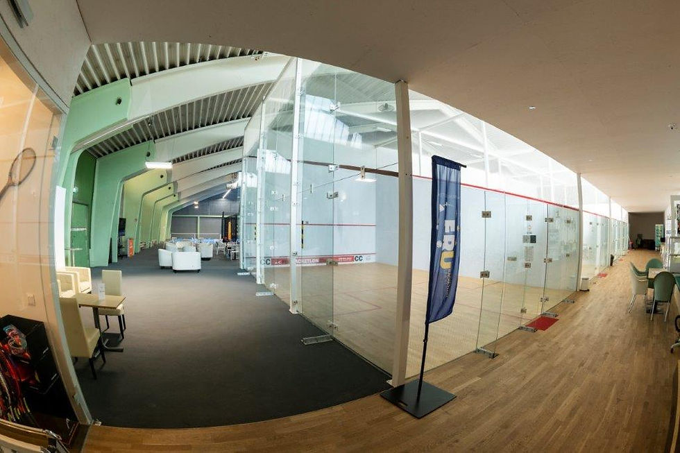 Squash courts including one glass side wall