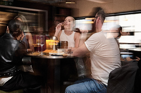 Guests enjoying cocktails and dining at The Uncommon in North Shields