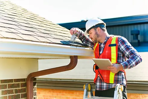 person-inspecting-roof-for-maintenance.webp