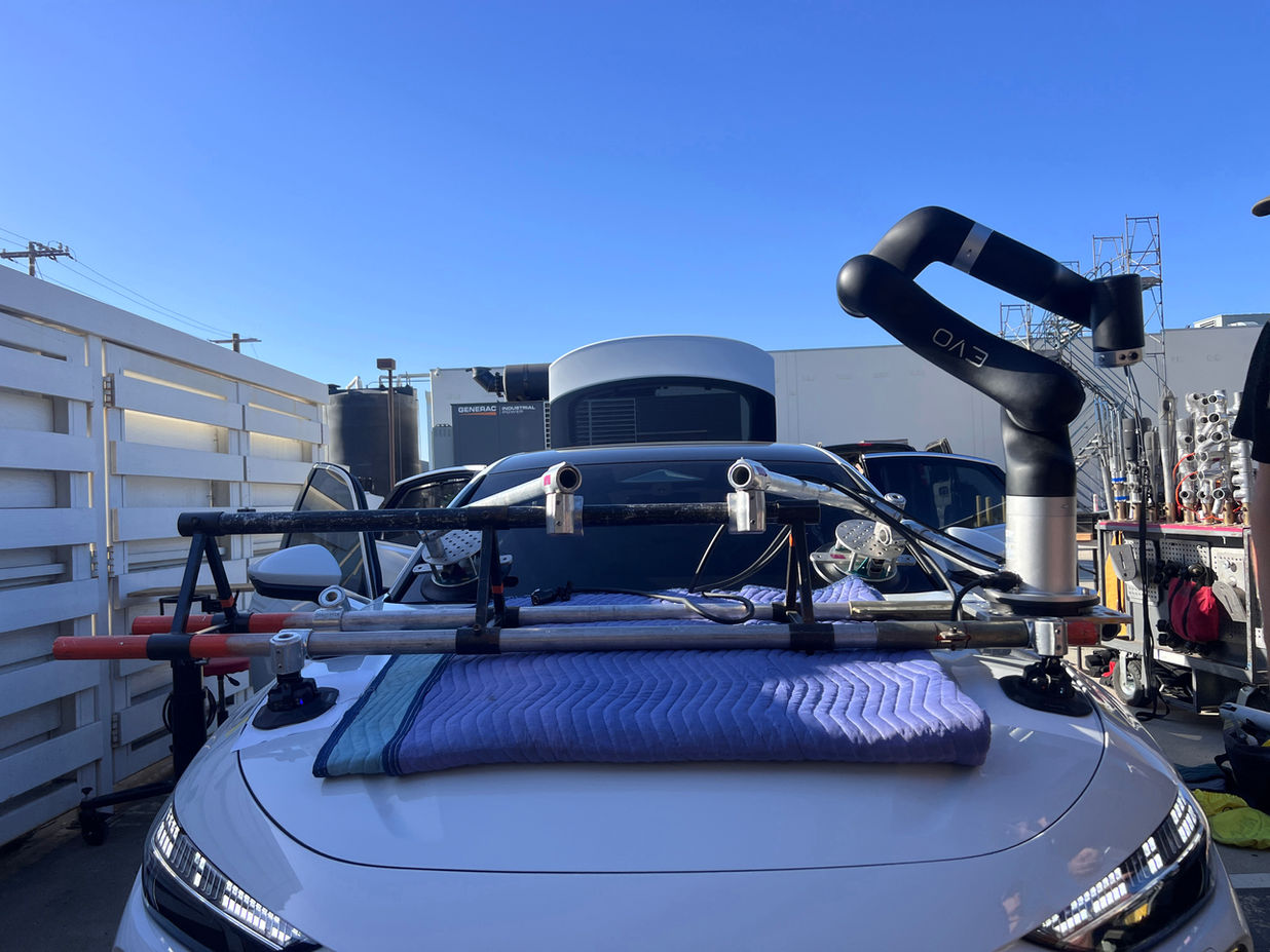 EVO Moco robot mounted a white Audi car for Audi 2025 car commercial.